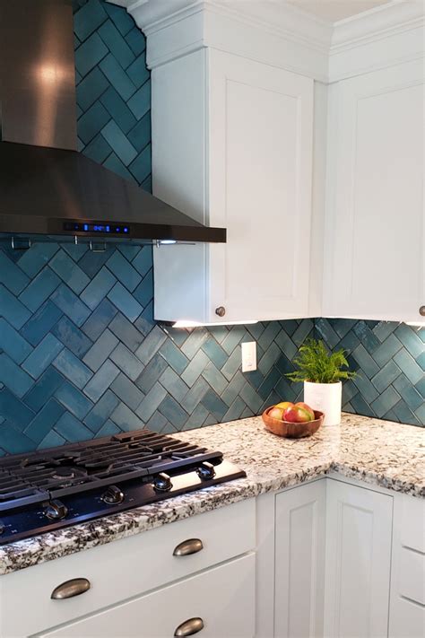 dark blue tile backsplash